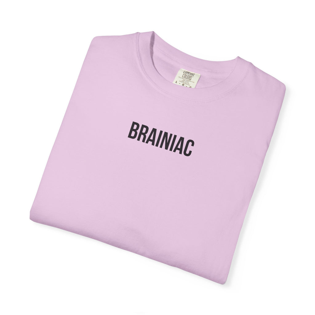 Folded light purple t-shirt with 'BRAINIAC' text on a white background