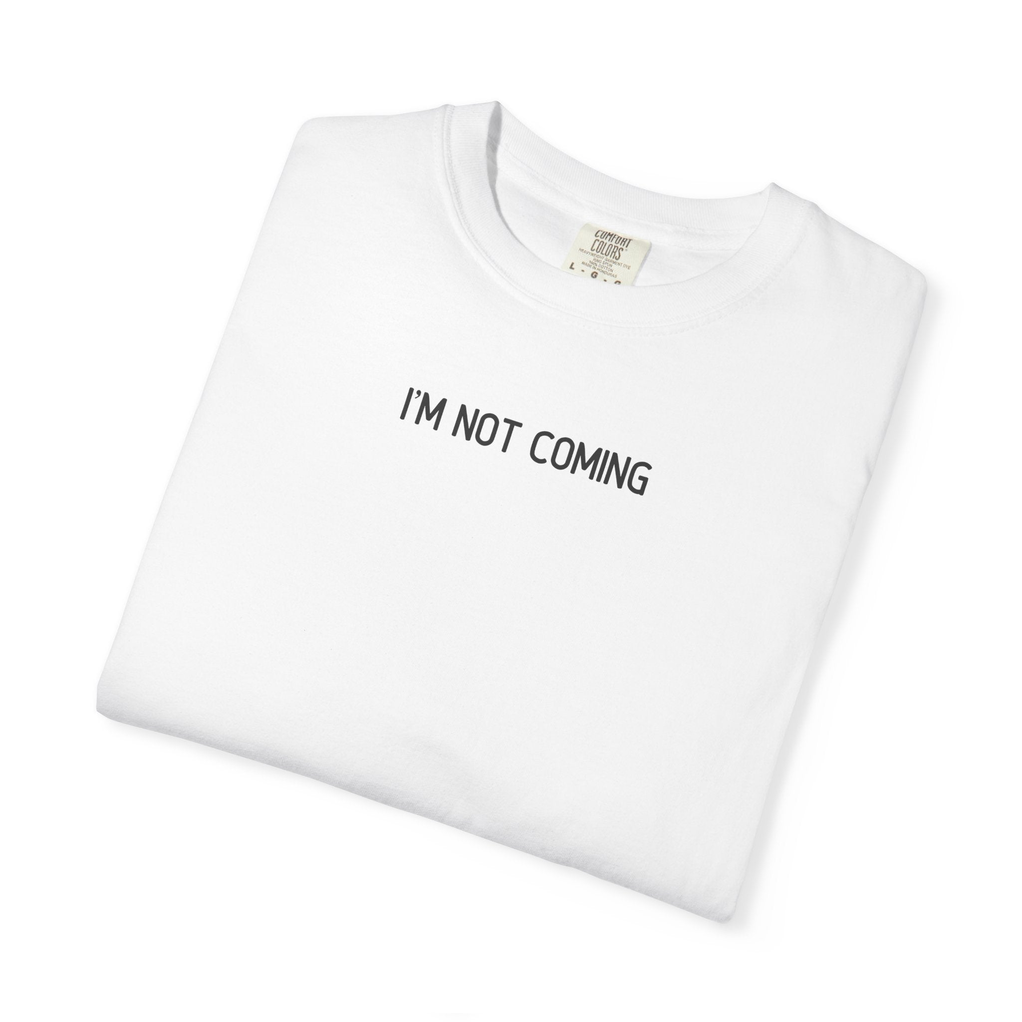 White t-shirt with 'I'M NOT COMING' text on a white background