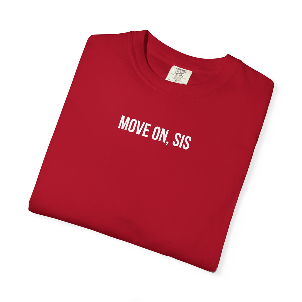 Folded red t-shirt with 'MOVE ON, SIS' text on a white background
